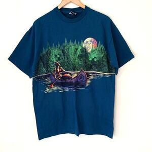 Vintage 90s signal Native American canoeing down river